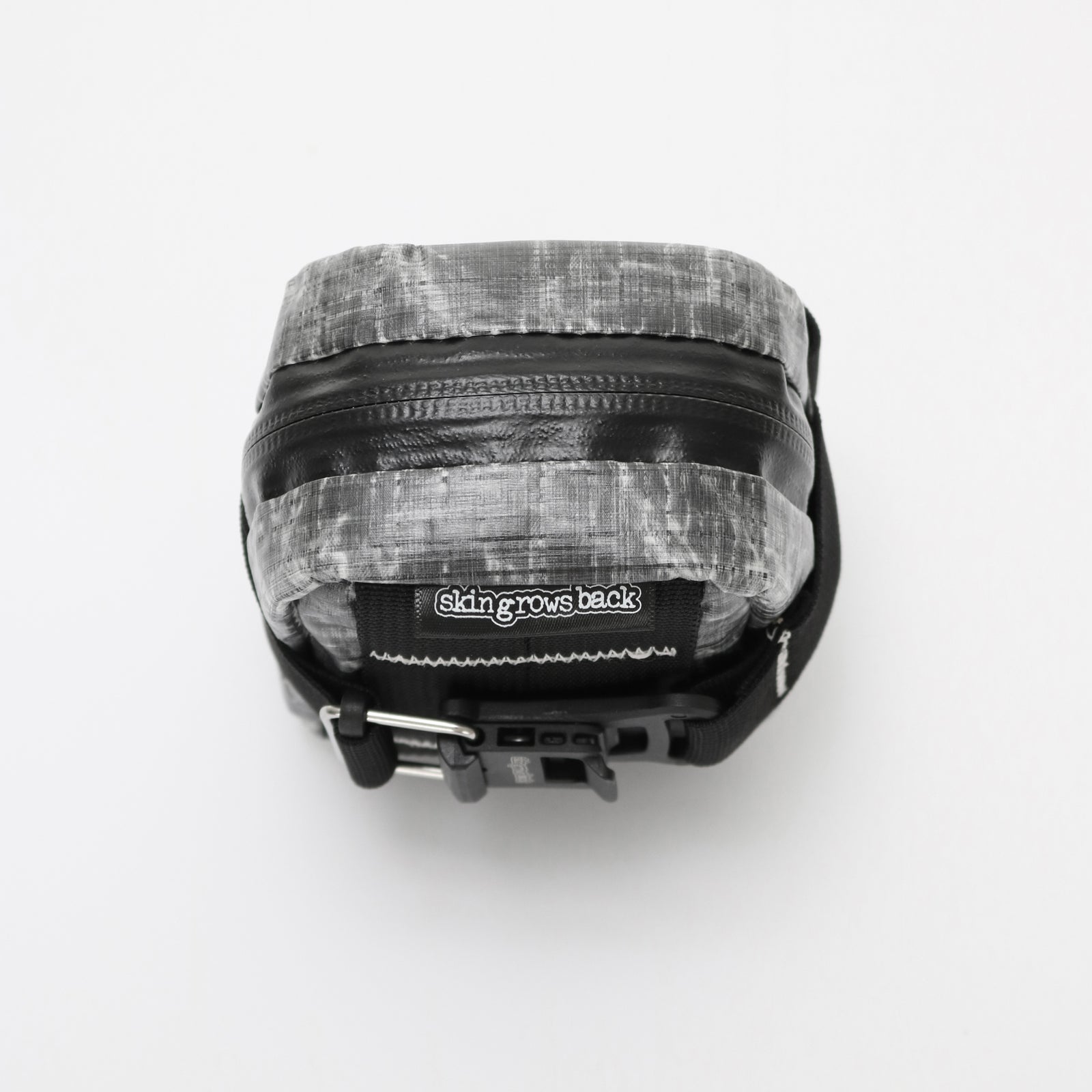 skingrowsback plan b micron saddle bag dyneema black against a white background
