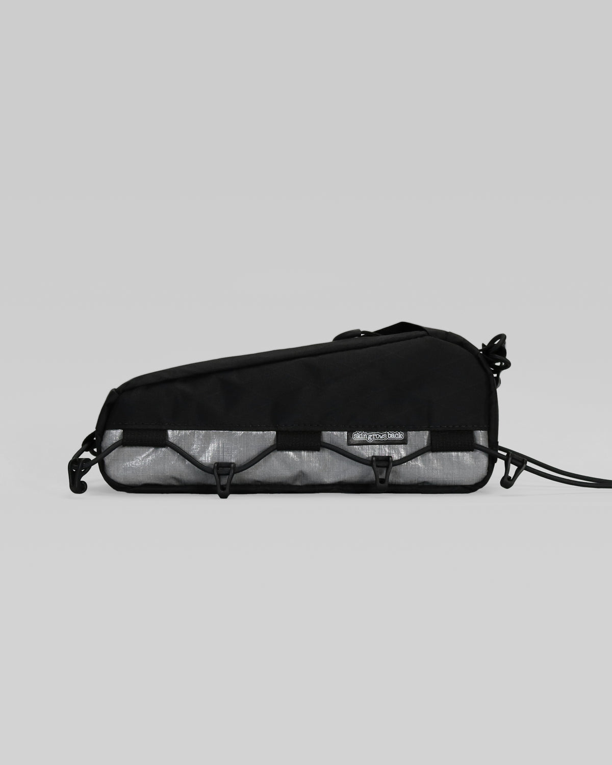 Skingrowsback transcend racing series hot dog racing top tube bag dyneema against a grey background
