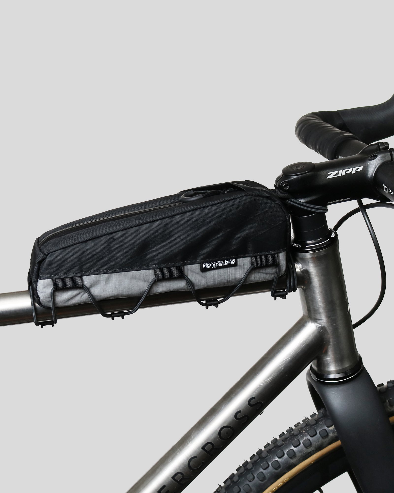 Skingrowsback transcend racing series hot dog racing top tube bag dyneema against a grey background