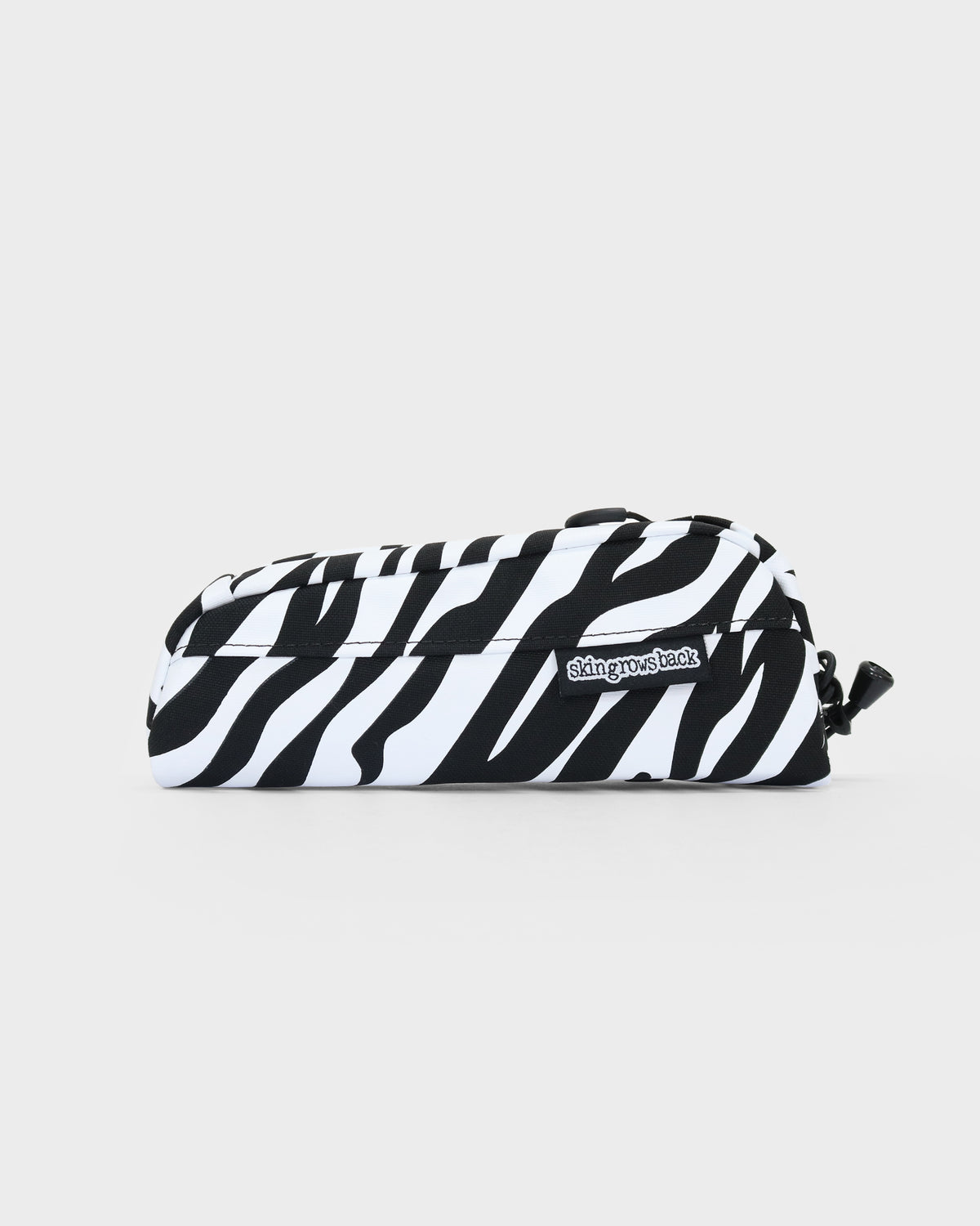 skingrowsback Hot Dog bolt on top tube bag black and white zebra print with a white background