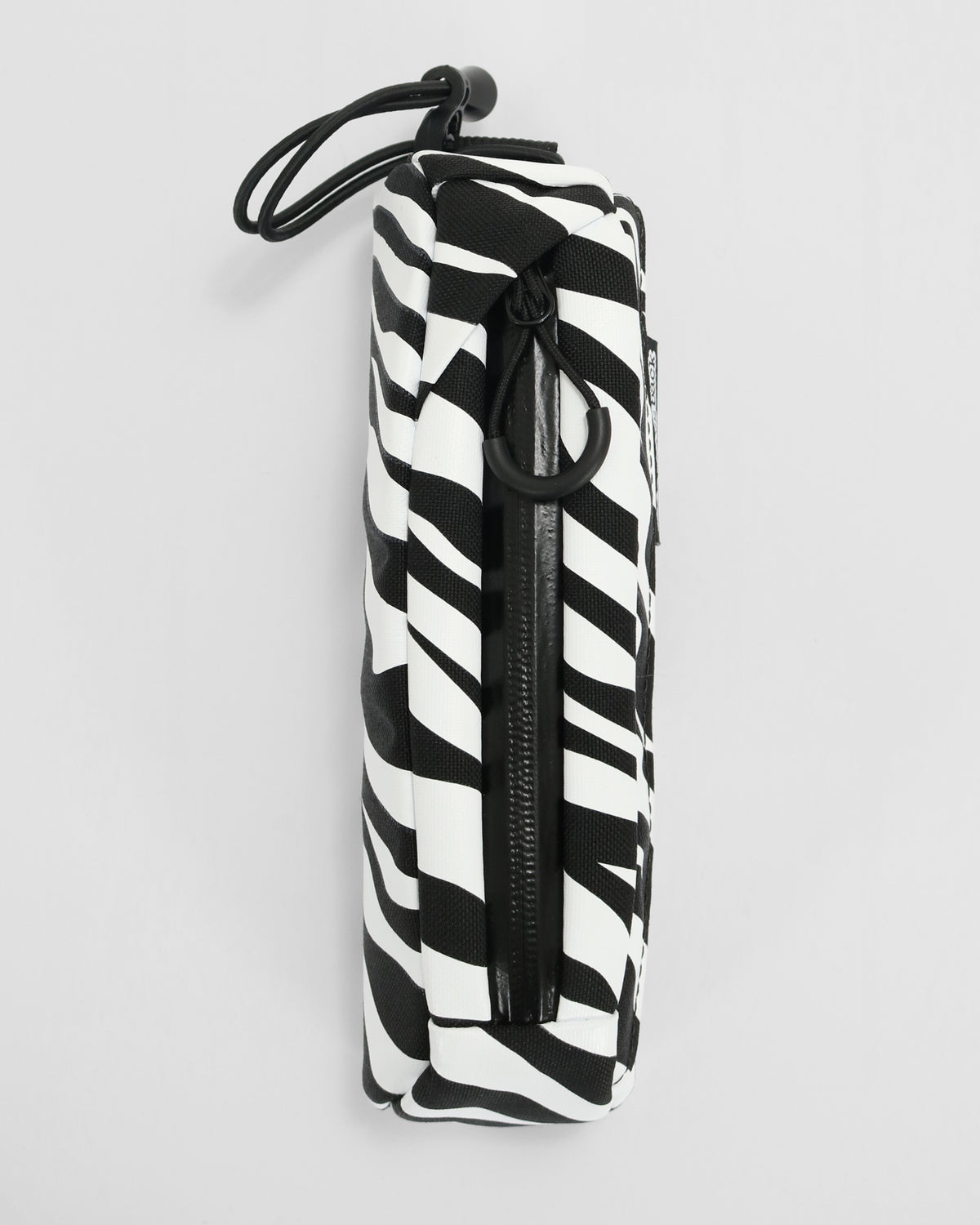 skingrowsback Hot Dog bolt on top tube bag black and white zebra print with a white background