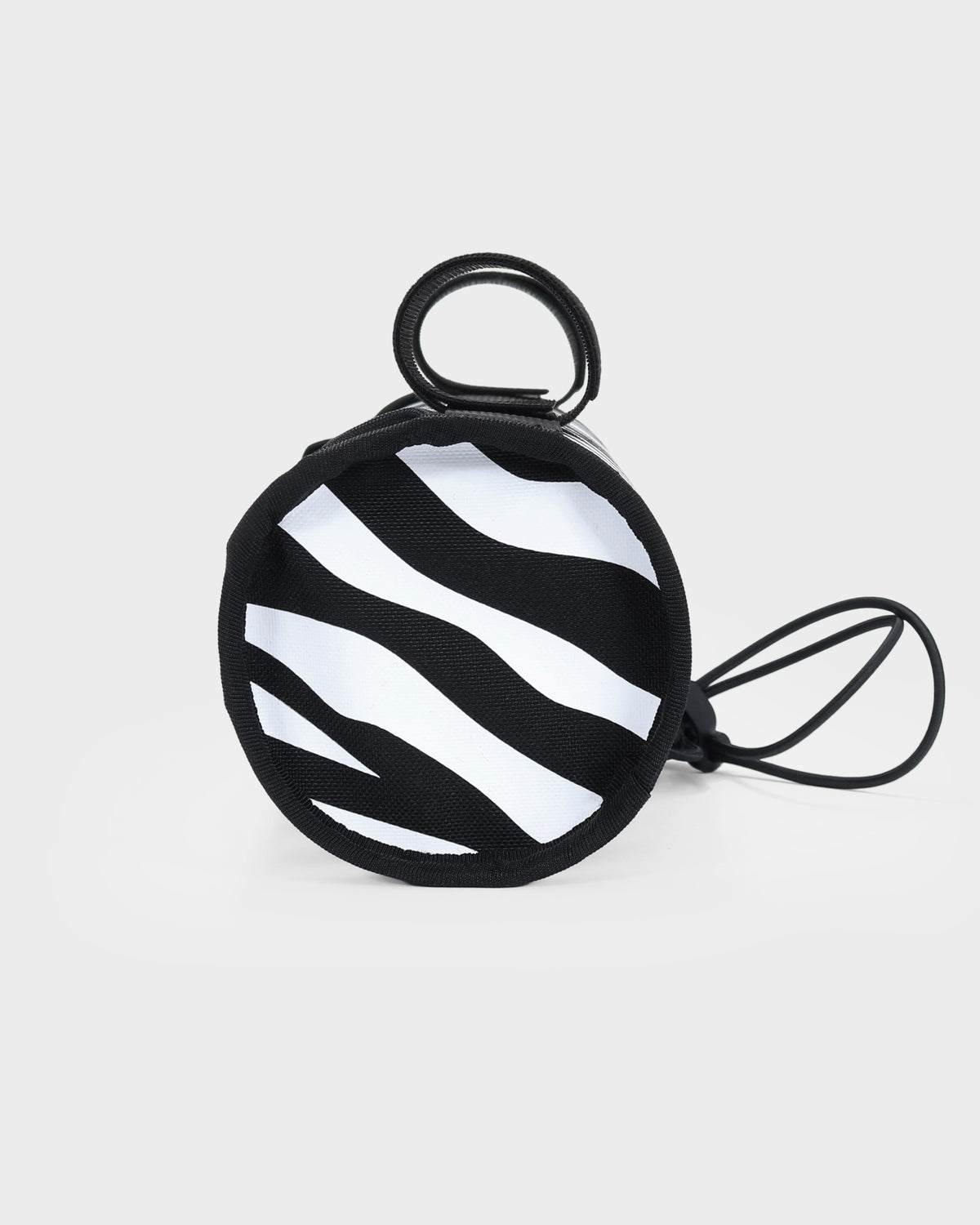 skingrowsback little lunch handlebar bag black and white zebra print with a white background