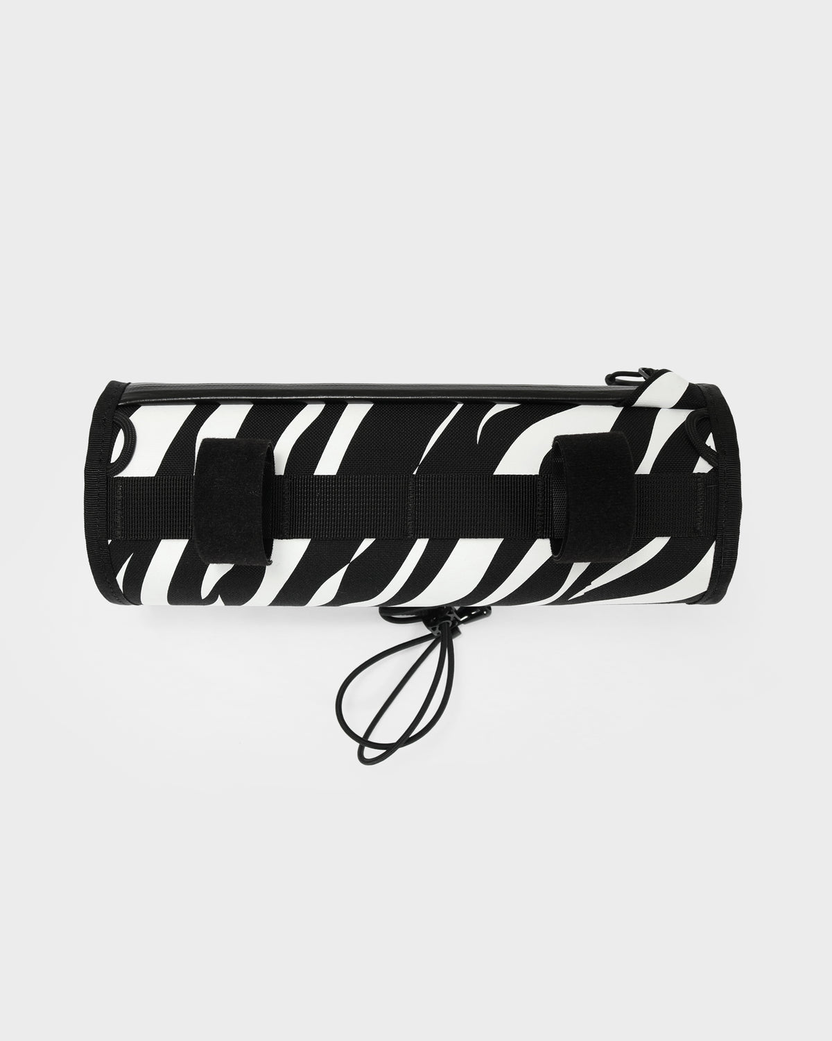 skingrowsback little lunch handlebar bag black and white zebra print with a white background