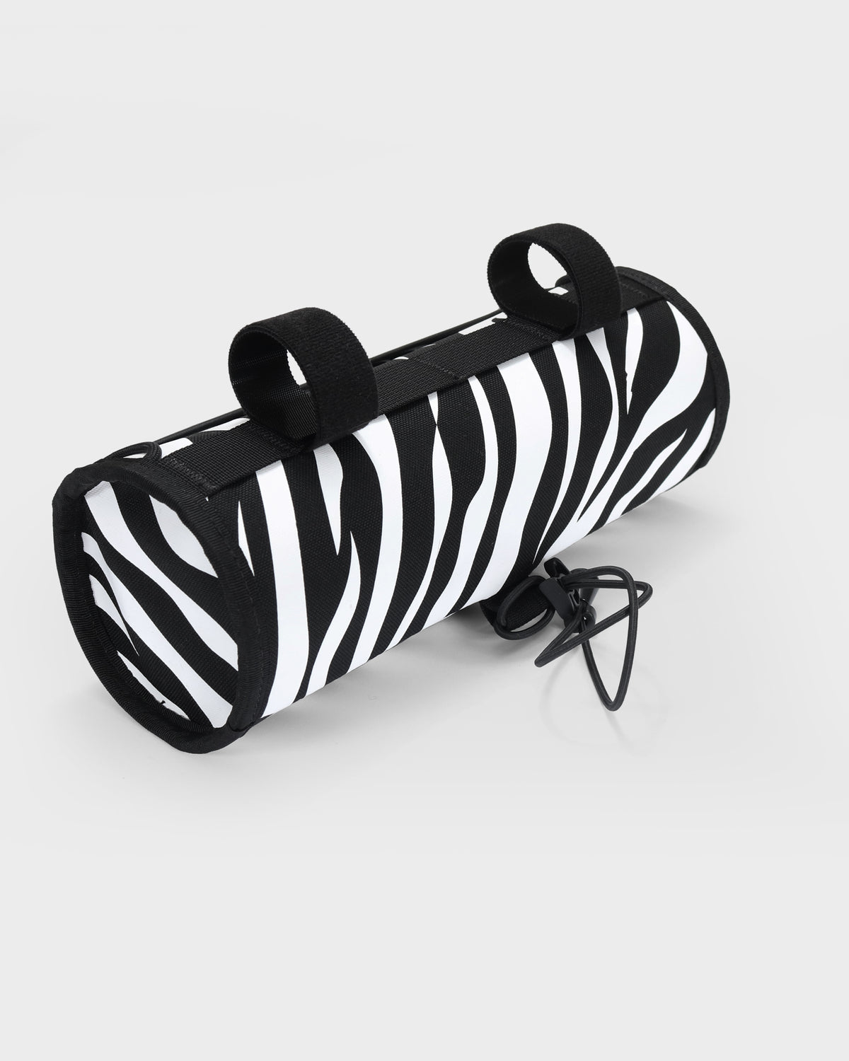 skingrowsback little lunch handlebar bag black and white zebra print with a white background