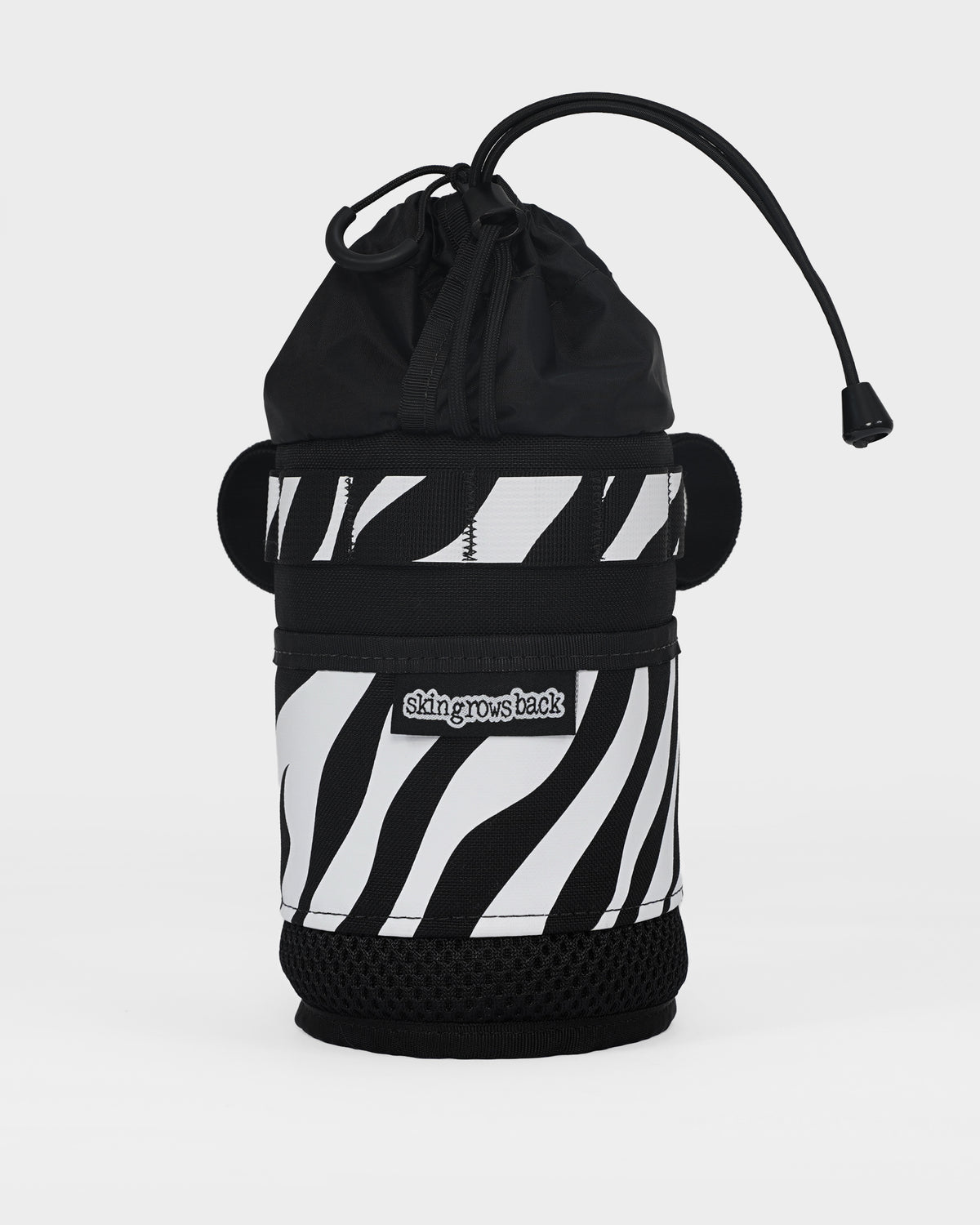 skingrowsback snack stack stem feed bag black and white zebra print with a white background