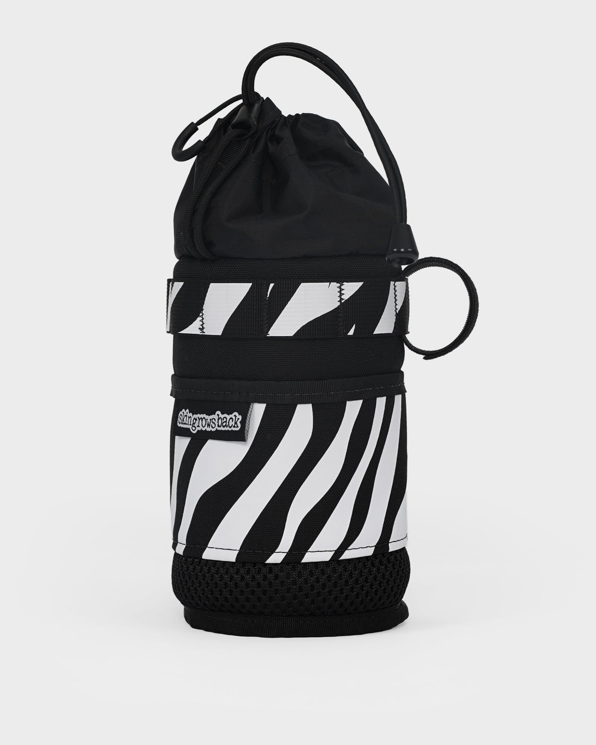 skingrowsback snack stack stem feed bag black and white zebra print with a white background