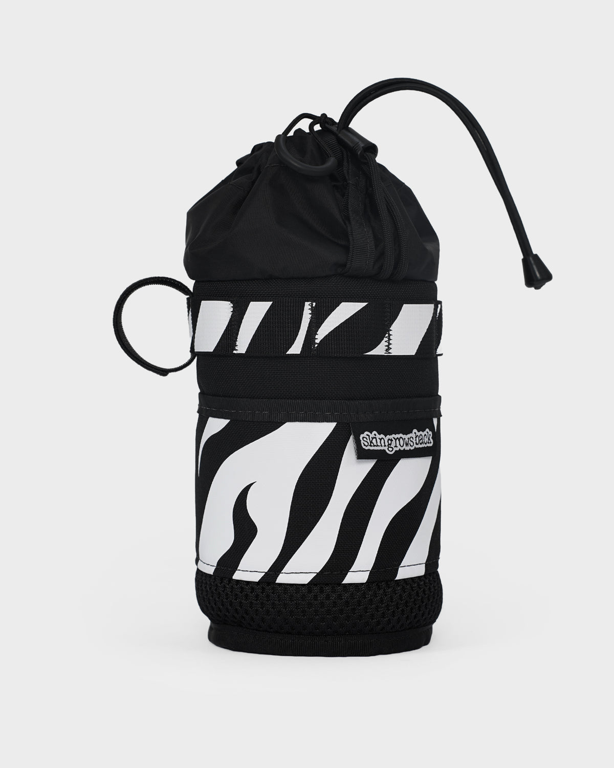 skingrowsback snack stack stem feed bag black and white zebra print with a white background