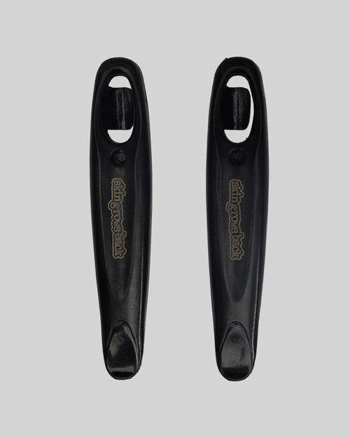 skingrowsback tyre black levers pair on grey background