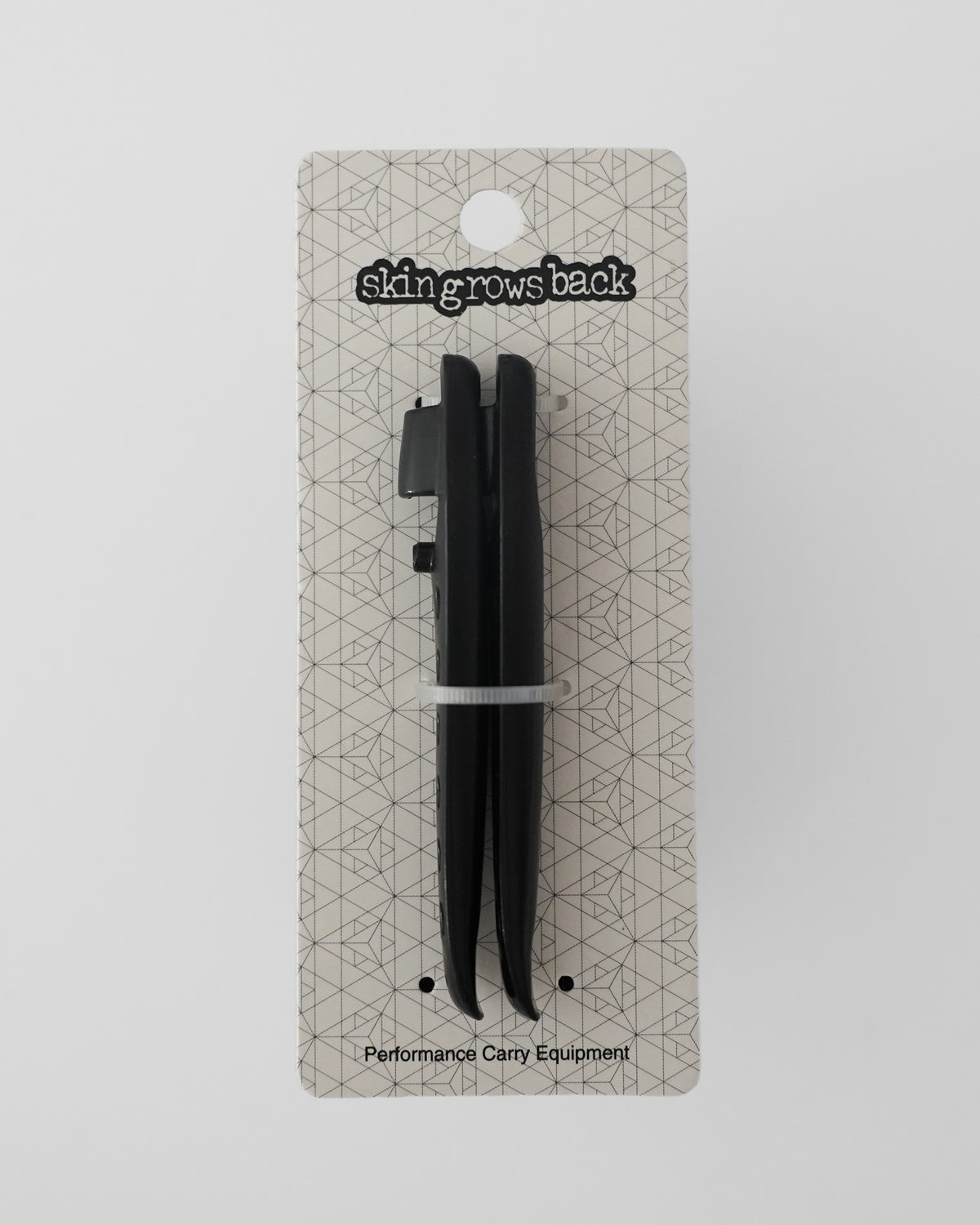 skingrowsback tyre black levers pair in white packaging on grey background