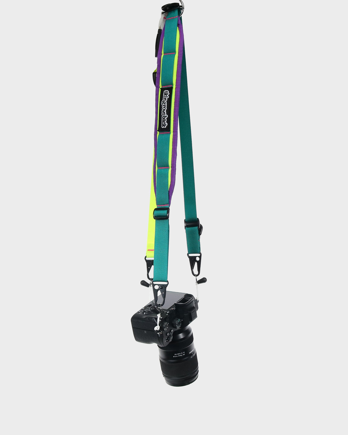 Skingrowsback 3Point cycling camera strap turbo colourful strap on a white background