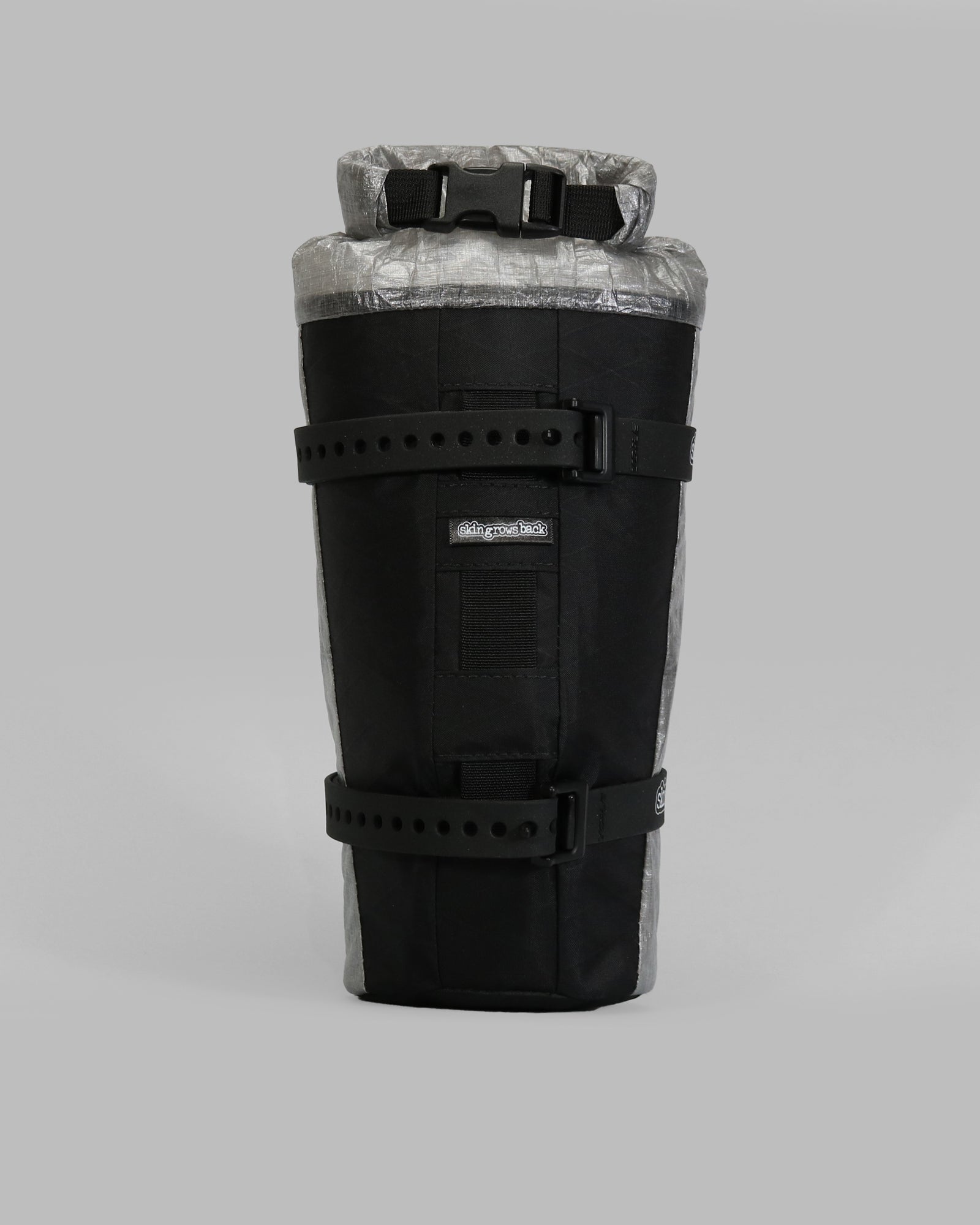 Skingrowsback transcend racing series moai bikepacking fork bag black xpac vx21 with silver dyneema against a grey background