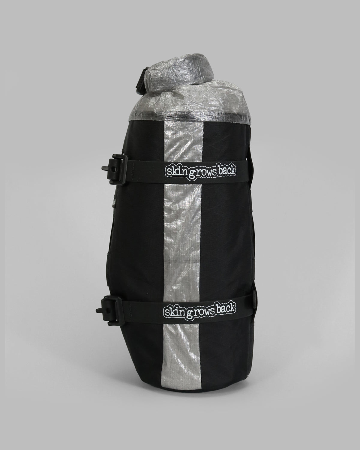 Skingrowsback transcend racing series moai bikepacking fork bag black xpac vx21 with silver dyneema against a grey background