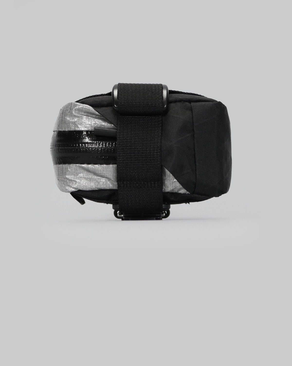 skingrowsback plan b micron racing saddle bag black xpac vx21 plus reflective dyneema on a grey background