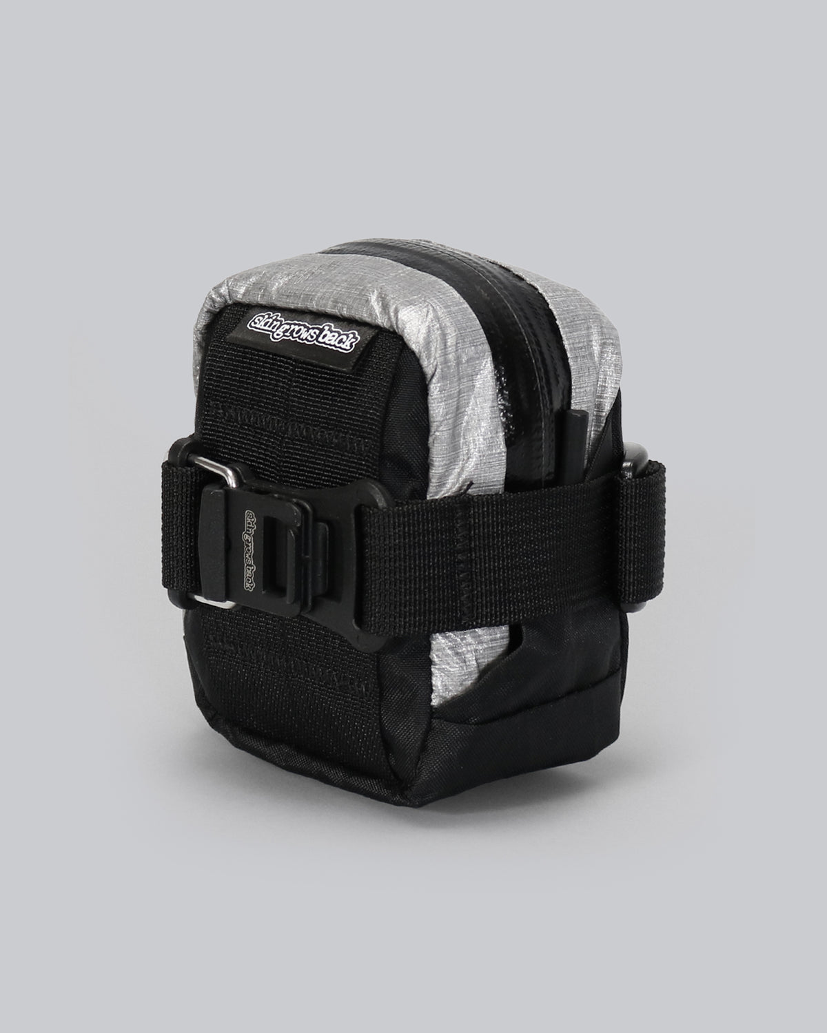 skingrowsback plan b micron racing saddle bag black xpac vx21 plus reflective dyneema on a grey background