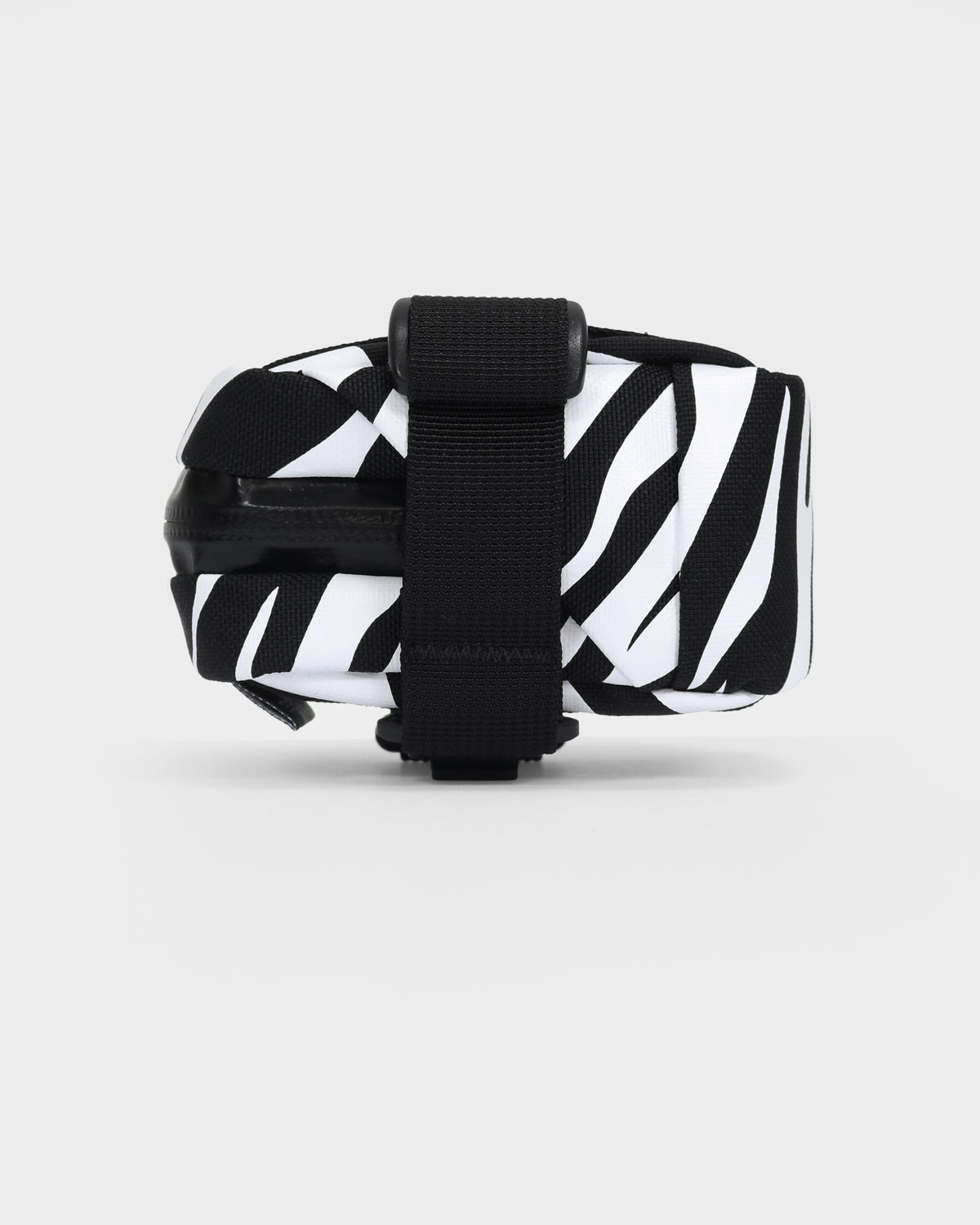 skingrowsback plan b micron saddle bag black and white zebra print with a white background