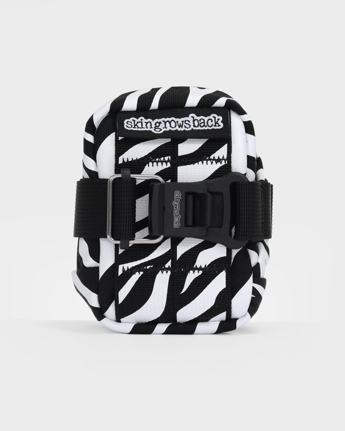 skingrowsback plan b micron saddle bag black and white zebra print with a white background