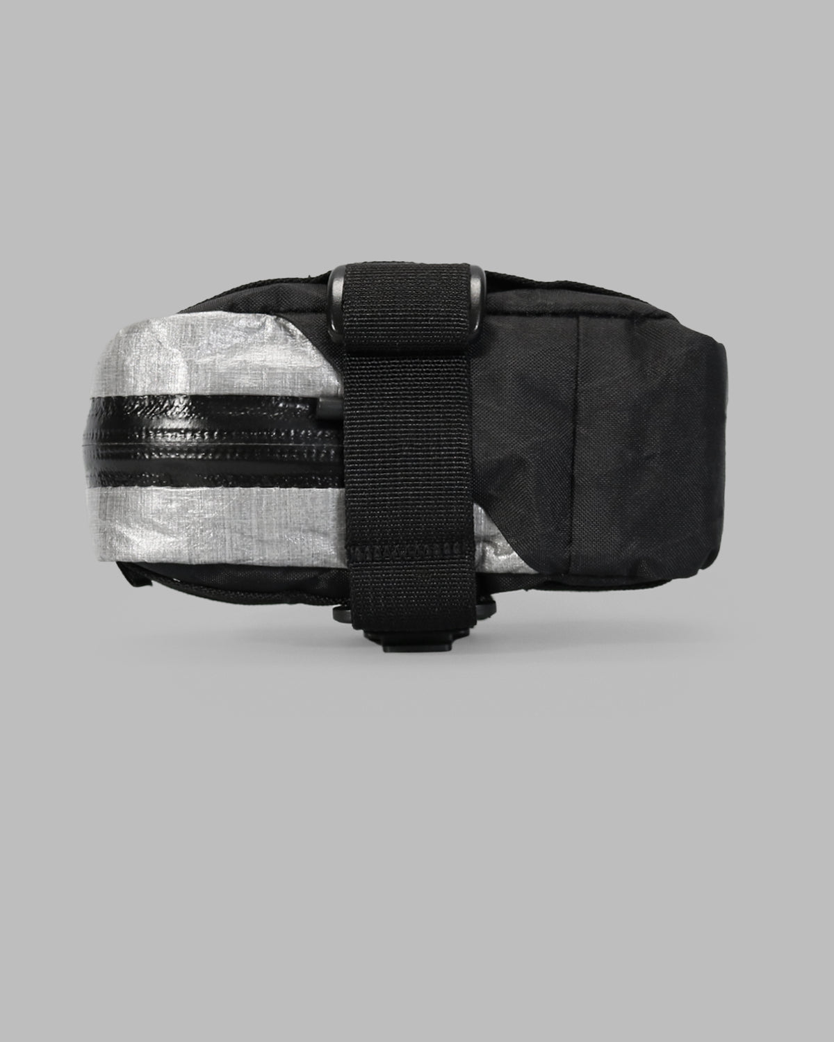 Skingrowsback plan b micron racing saddle bag black xpac vx21 plus reflective dyneema with a grey background