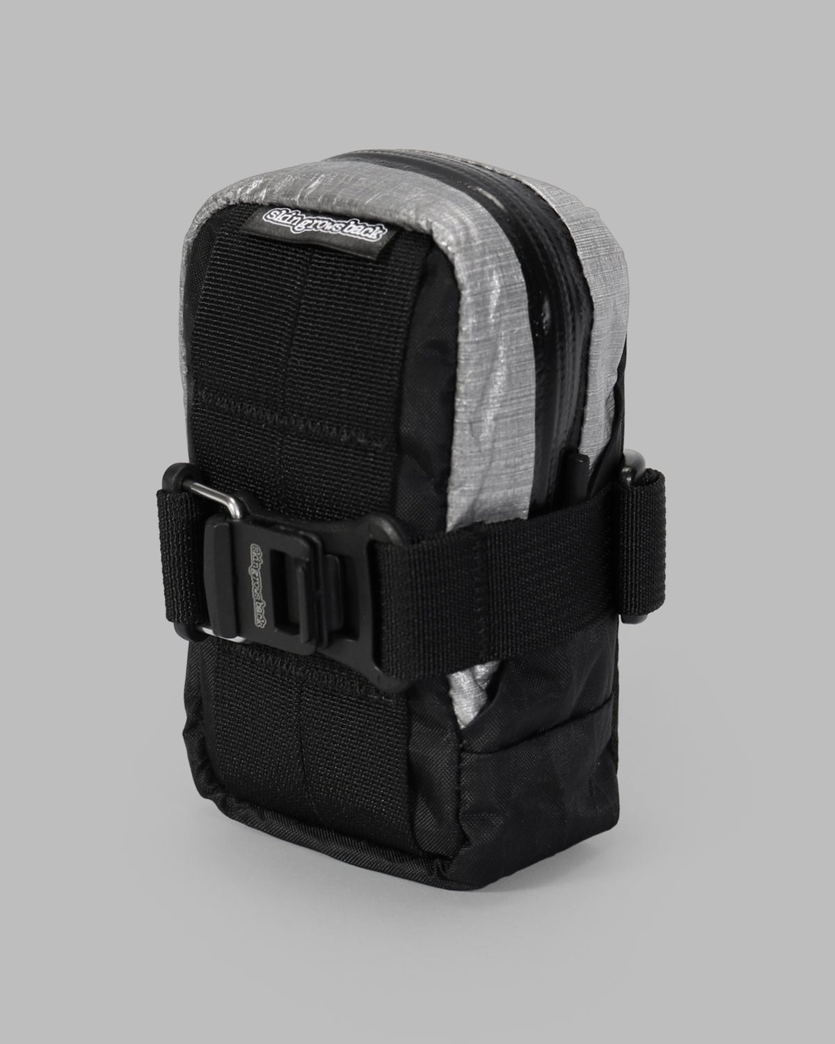Skingrowsback plan b micron racing saddle bag black xpac vx21 plus reflective dyneema with a grey background