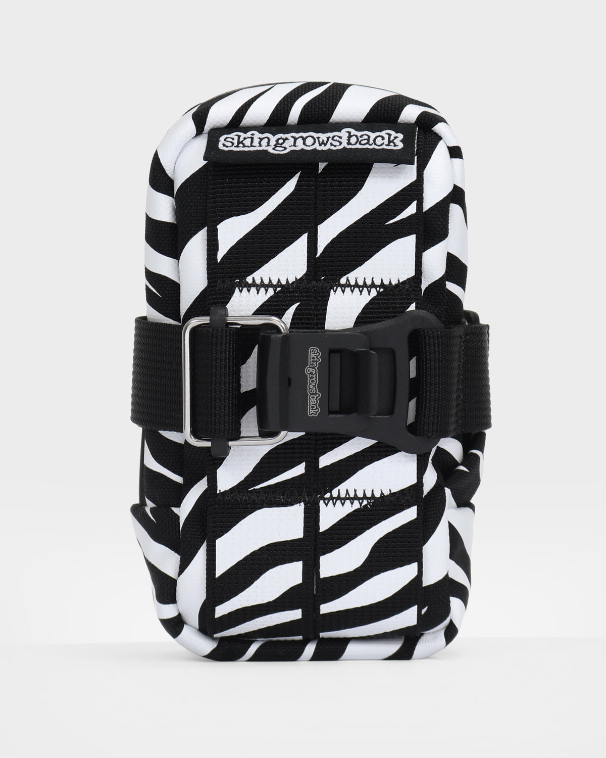 skingrowsback plan b saddle bag black and white zebra print with a white background