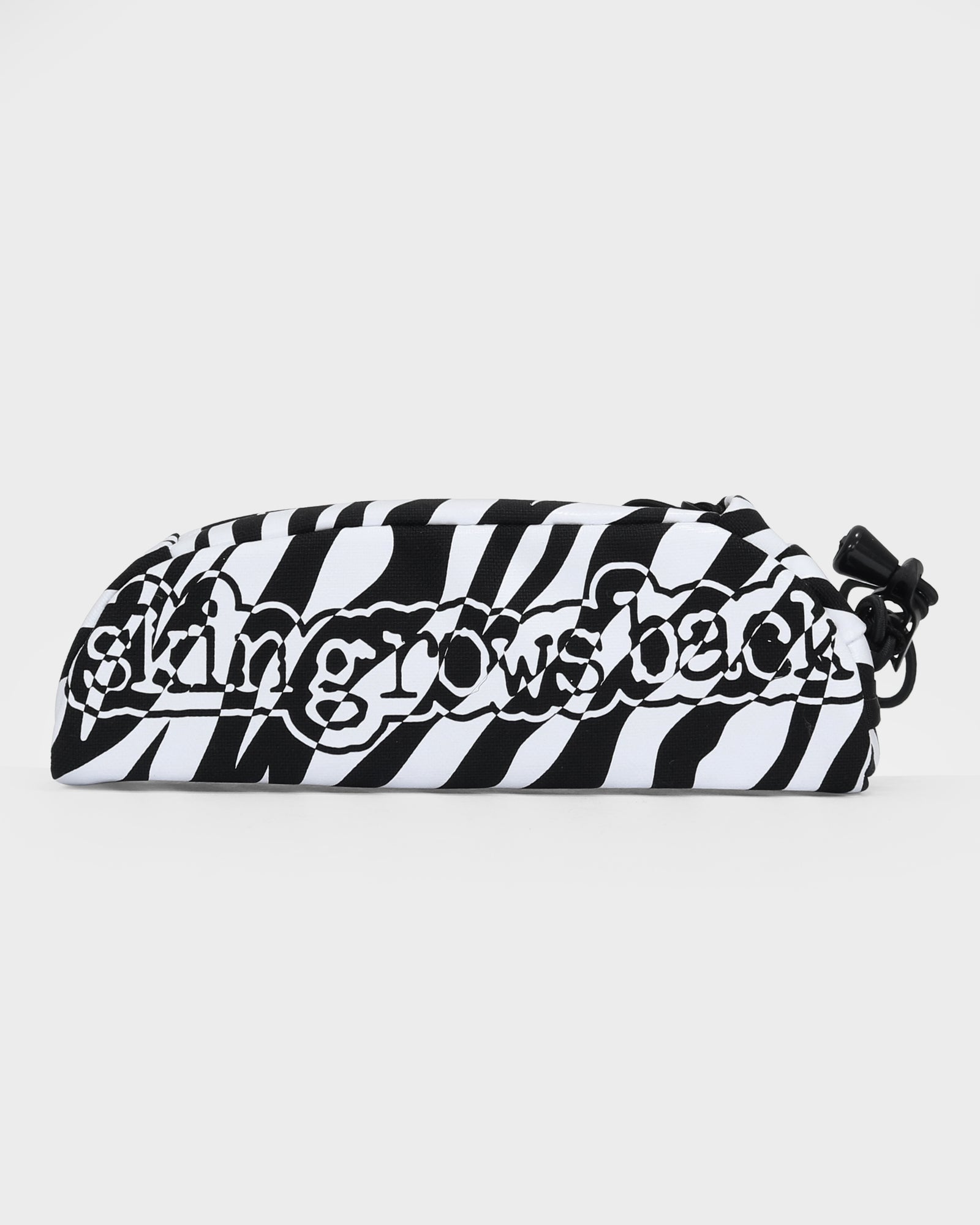 skingrowsback shortie top tube bag black and white zebra print with a white background