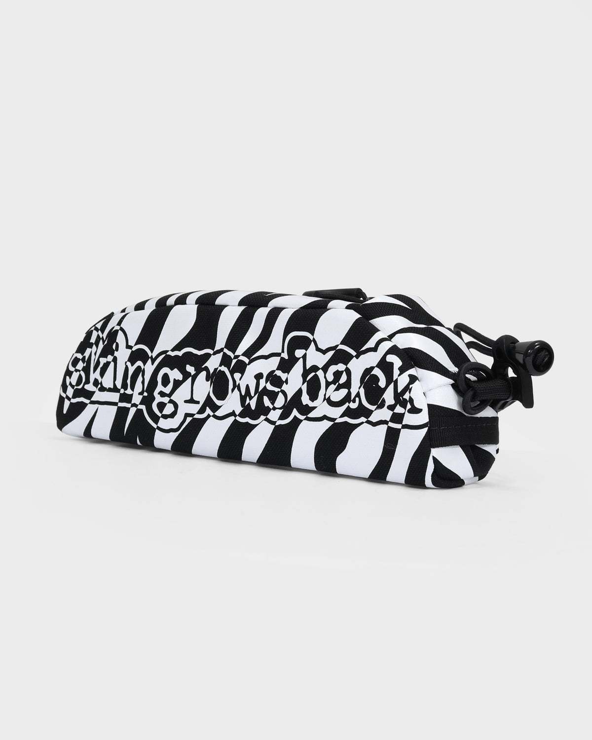 skingrowsback shortie top tube bag black and white zebra print with a white background