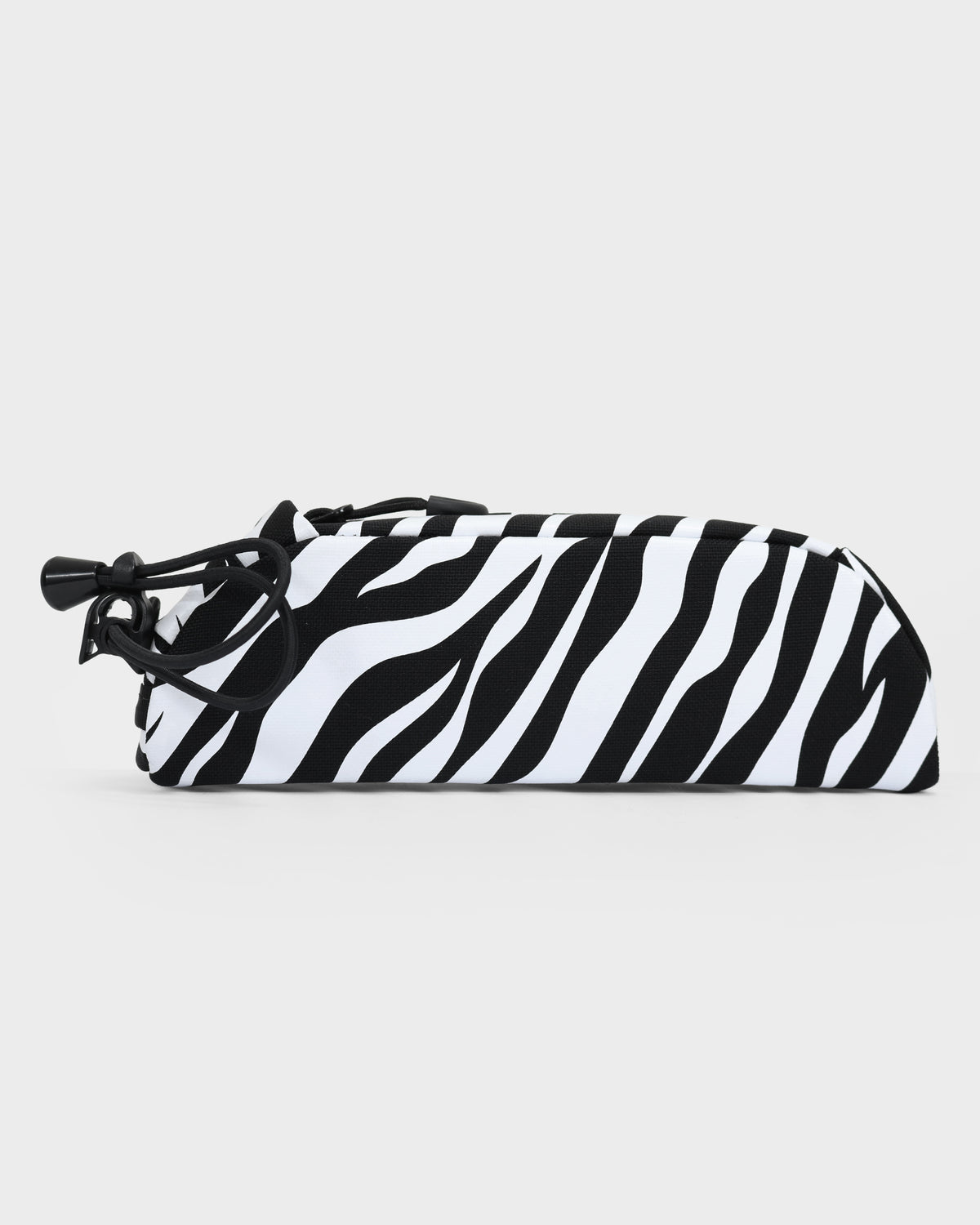 skingrowsback shortie top tube bag black and white zebra print with a white background