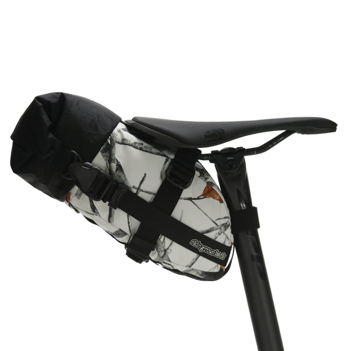 skingrowsback flash pak bike packing saddle bag snowfall