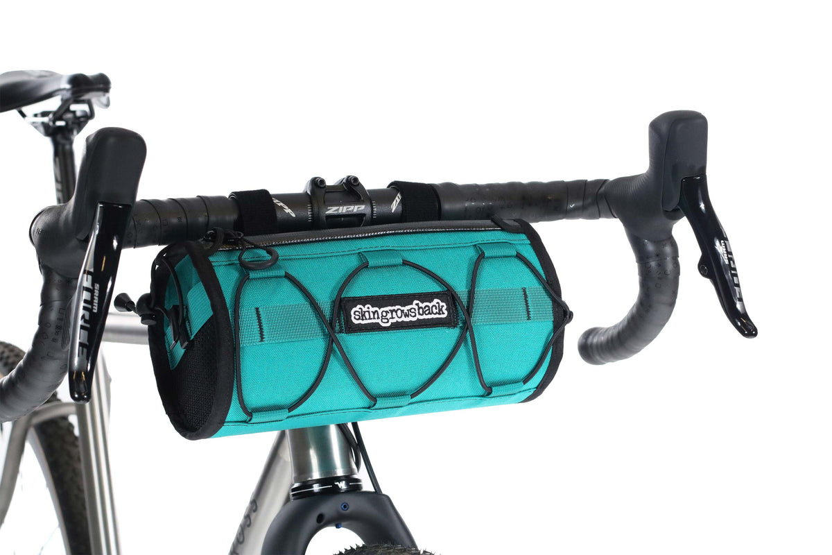 skingrowsback lunchbox cycling handlebar bag gravel bike teal made in australia
